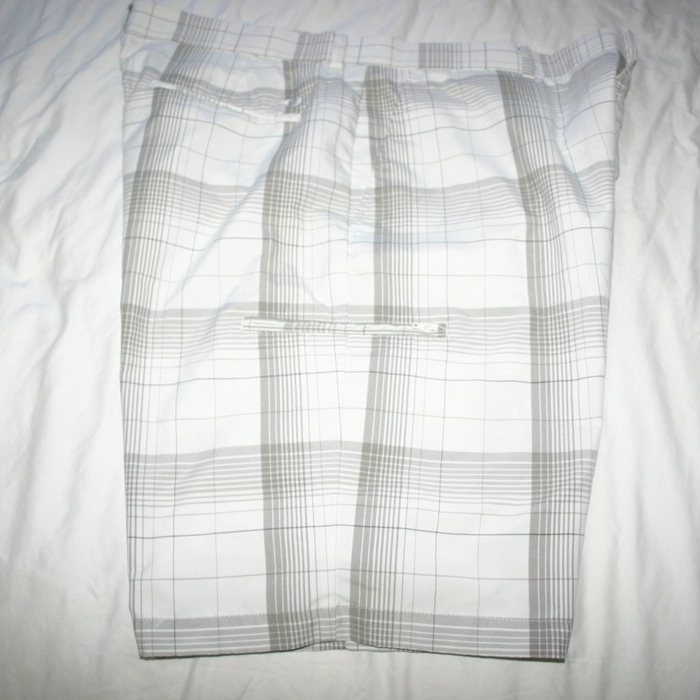 Grand Slam Golf Shorts in White with gray. Zipper pocket for tees pencil size 38